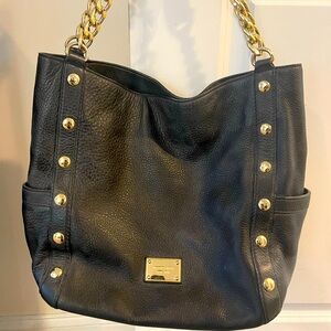 Beautiful black leather, Michael Kors bag with gold hardware detailing